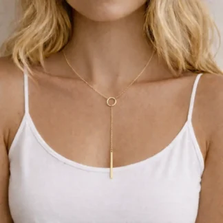 collar con circulo y barra dorada