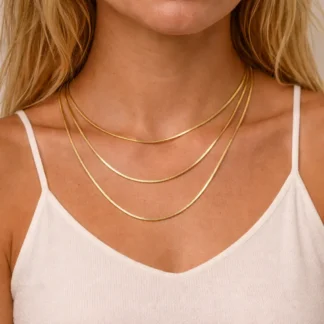 collar triple cadena acero inoxidable dorado